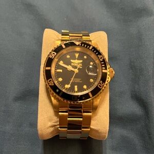 Invicta Gold Watch with Black Face